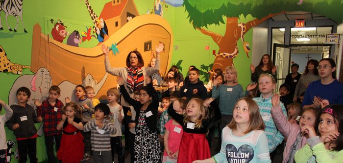 A group of children at worship