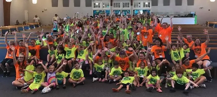 Large group of kids and VBS volunteers